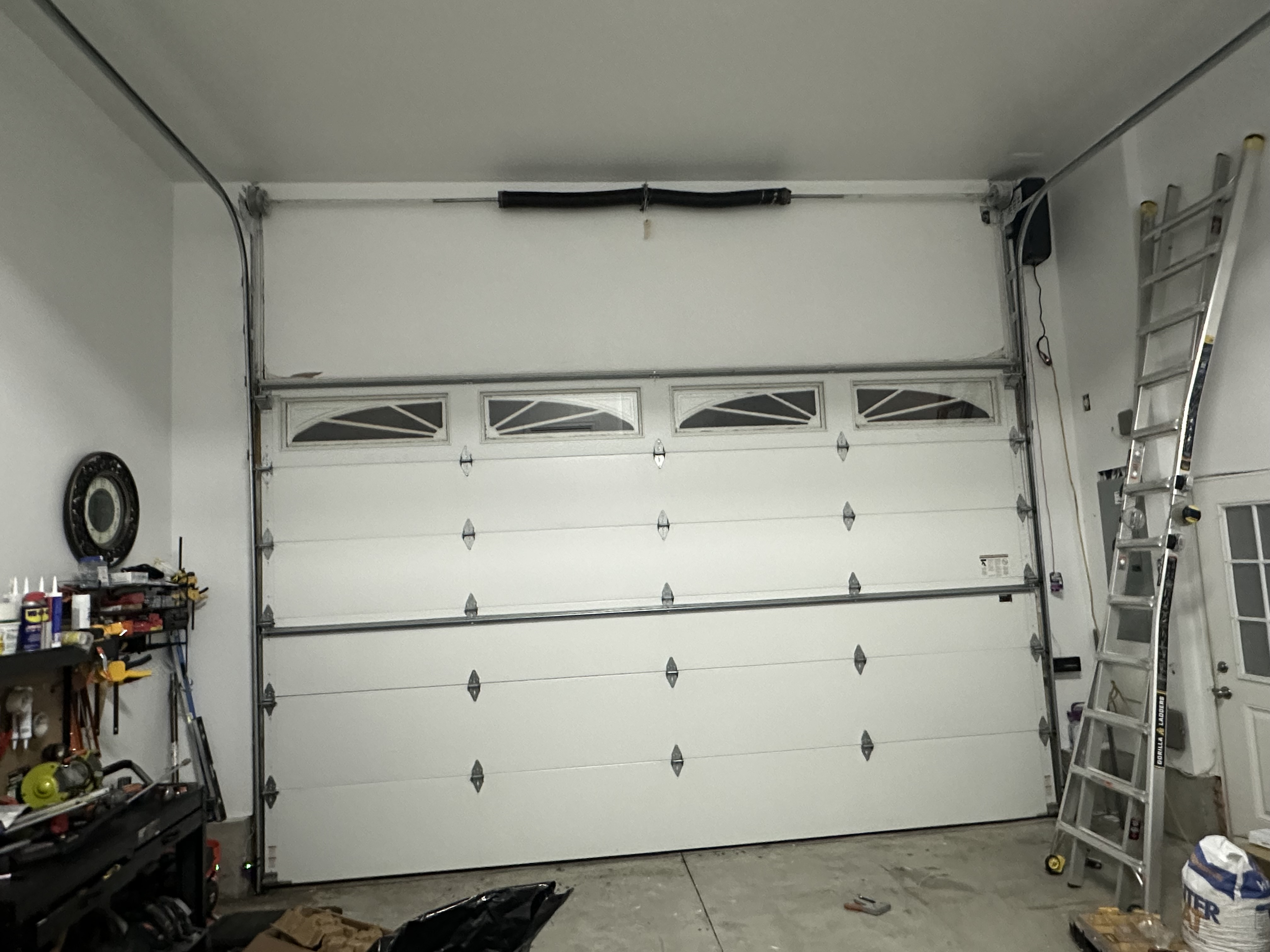 Residential garage door with decorative windows