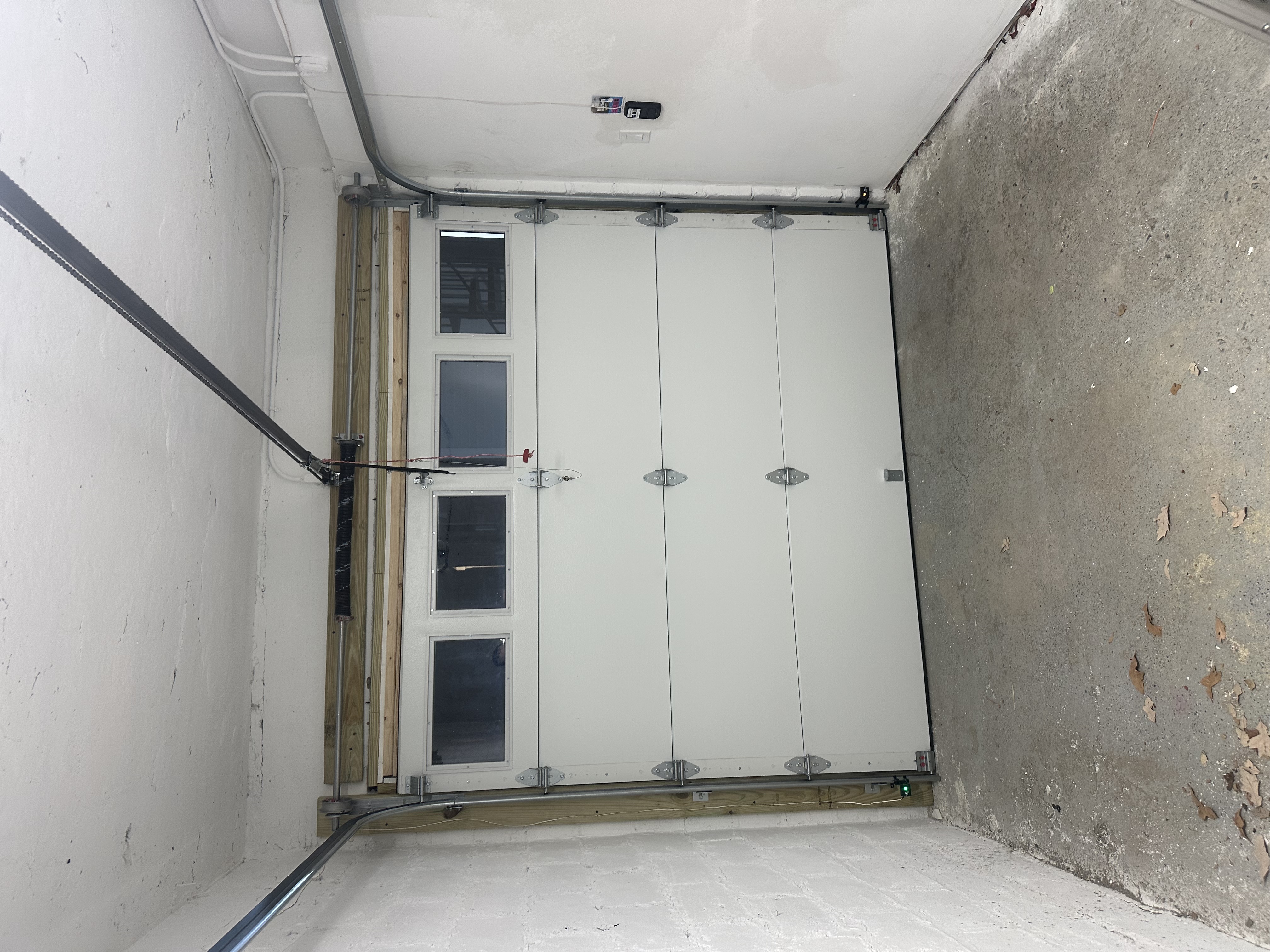Garage door installation with side windows